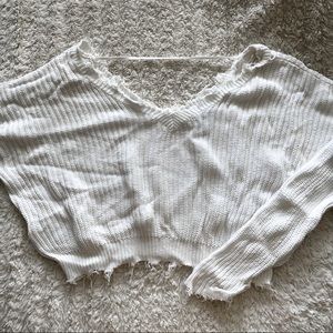 White frayed hem sweater